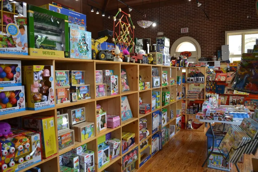 rows of infant, girls, and boys toys at Back in Time Toys