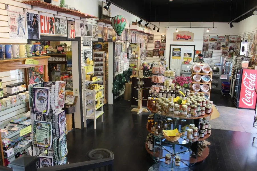 interior of Dicken's Gift Shop with candy, food items, and other decor