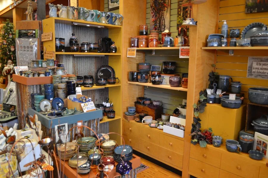 interior of Peter Engler Designs Shop displaying ceramic bowls, cups, and more
