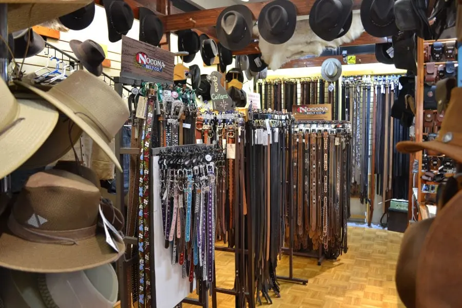 belts and hats on display at Sunrise Leatherworks