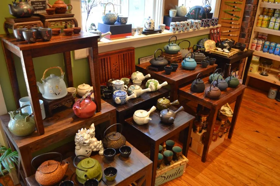 various displays of tea pots at TeaMaze Tea Shop