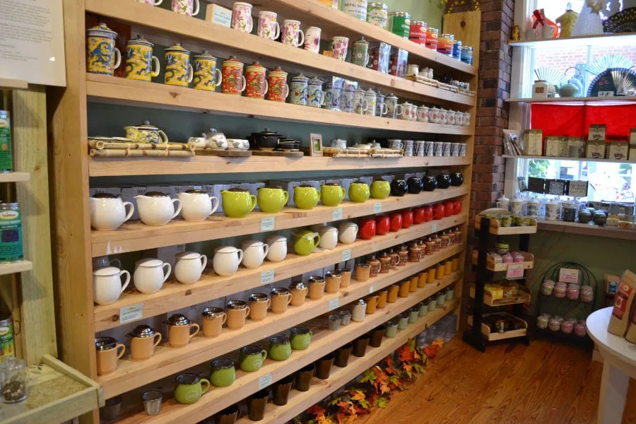 wall of tea cups, mugs, and tea pots at TeaMaze